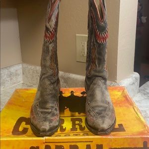 Corral boots with distressed Indian head details